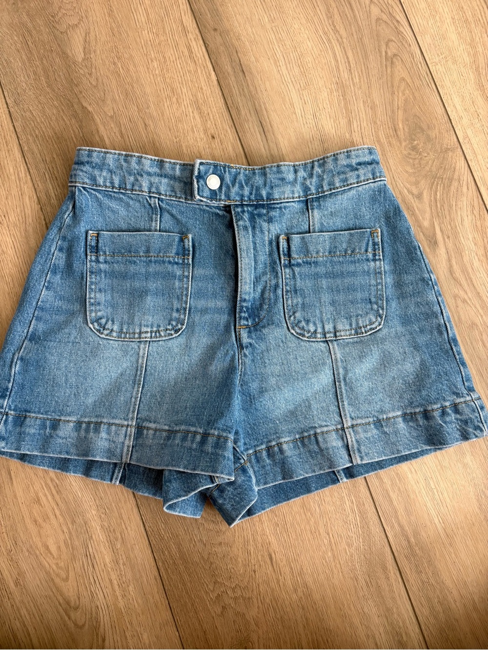 High-Waist Light Blue Denim Shorts with Front Patch Pockets